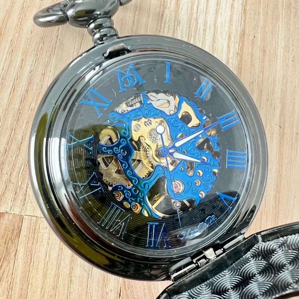Black mechanical double sided Skelton peephole pocket watch working